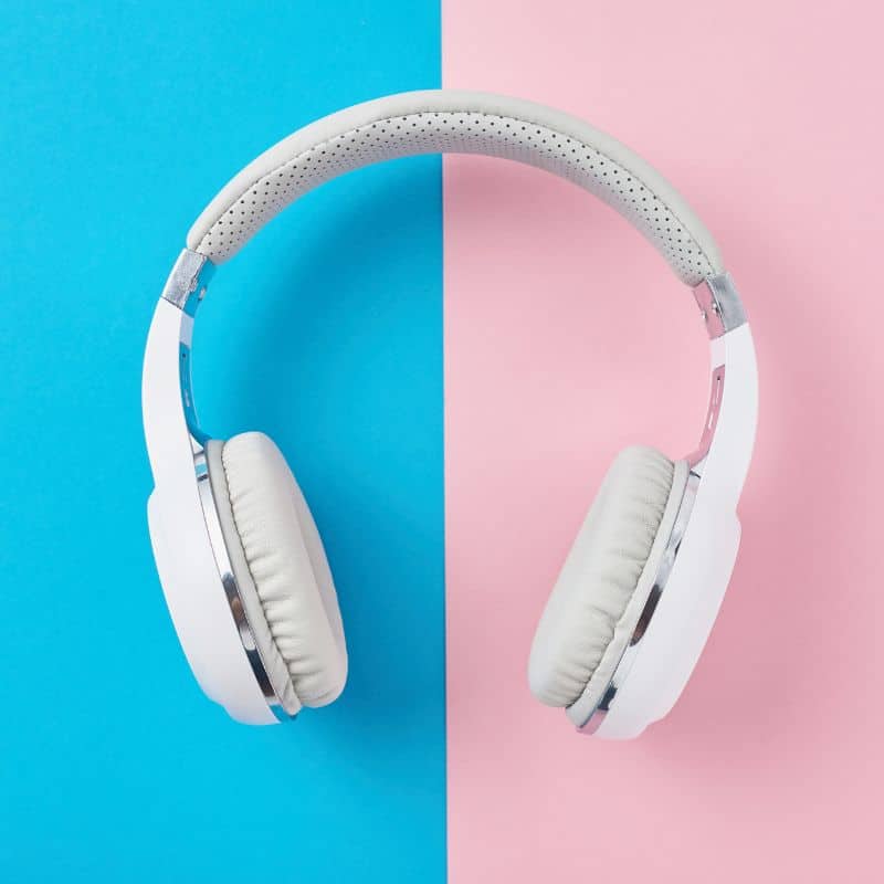 White Wireless Headphone With Pink And Blue Background